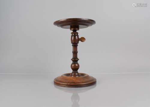 A Georgian Mahogany Candle Stand with Lipped Circular Top Ra...