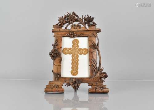 A Late 19th Century Black Forest Easel Back Picture Frame of...