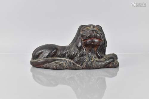 An 18th/19th Century Cast Iron Doorstop in the Form of a Rec...