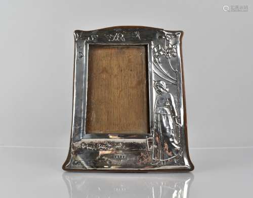 A Silver Mounted Easel Back Photo Frame decorated in Relief ...