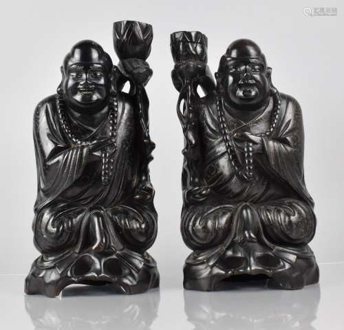 A Pair of Late 19th Century Chinese Hardwood Figural Candle ...