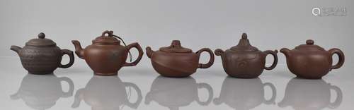 A Collection of Five Various Chinese Yixing Teapots all with...