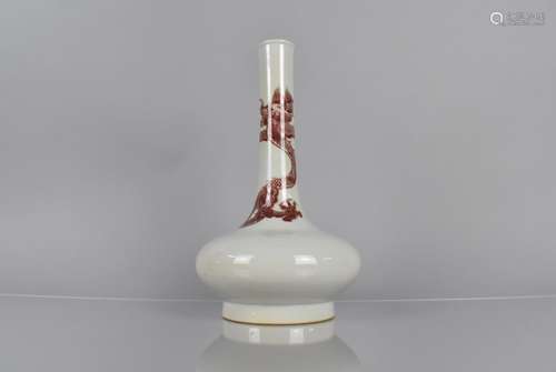 A Chinese Porcelain Bottle Vase decorated with Red Dragon, S...