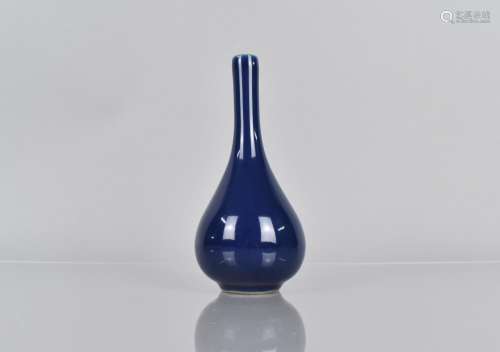A Chinese Monochrome Bottle Vase, Blue Glaze Seal Mark to Ba...