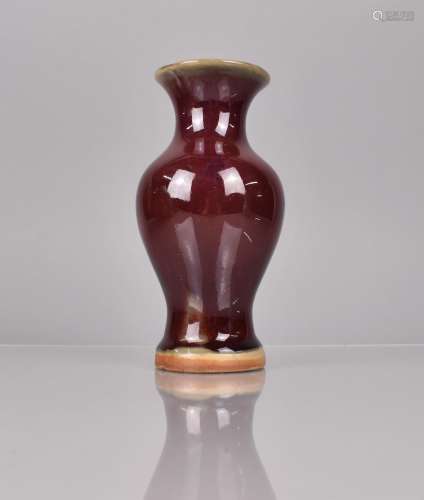 A Small Chinese Sang De Boeuf Vase, 16cms High