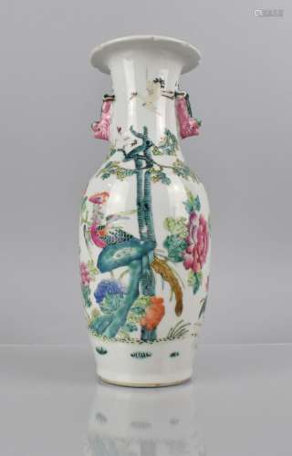 A Chinese Porcelain Vase decorated in the Famille Rose Palet...