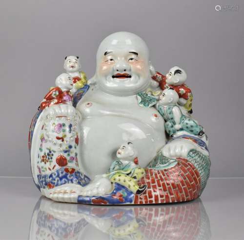 A 20th Century Chinese Porcelain Figure Group, Seated Buddha...