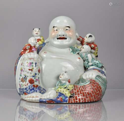 A 20th Century Chinese Porcelain Figure Group, Seated Buddha...