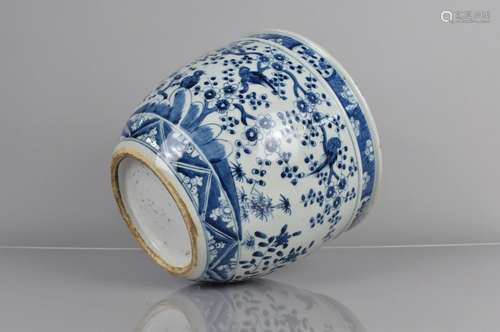 A Chinese Blue and White Planter decorated with Birds in Blo...