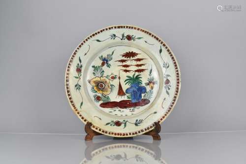 An 18th Century Dutch Delft Charger with Polychrome Decorati...