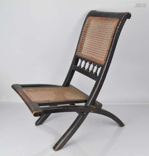 A 19th Century Ebonised Wooden Folding Chair and Back, 60cms...
