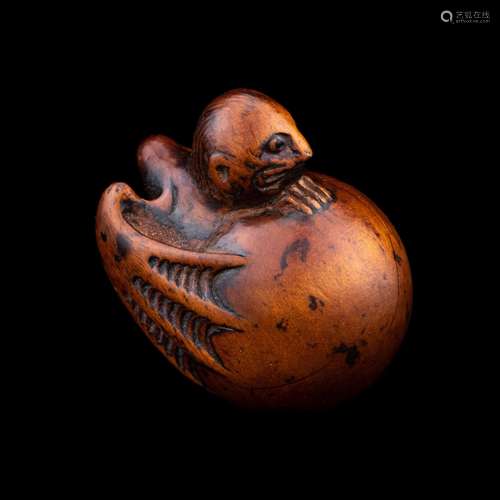 A Japanese Wood Netsuke of Hatching Tengu