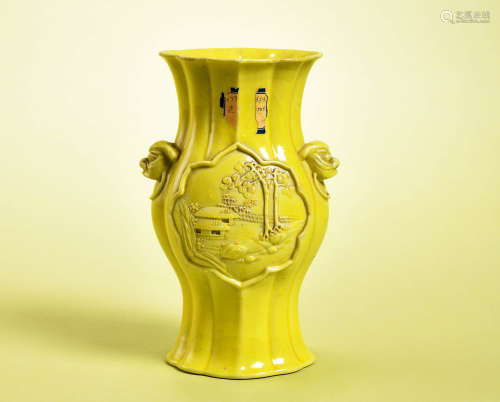 清 黄釉雕瓷开光山水海棠形狮耳衔环瓶