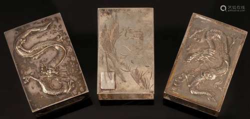 Three Chinese silver match boxes, 19th/20th Century, two eng...