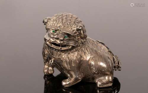 A Chinese silver foo dog, 19th/20th Century, with embossed h...
