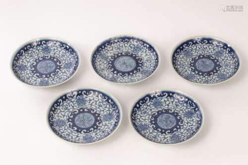 A set of five Chinese blue and white porcelain saucers, mid ...