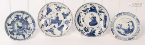 Four Chinese blue and white porcelain saucers, Kangxi, the t...