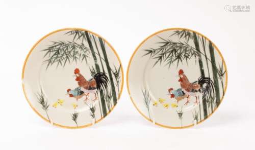 A pair of Chinese porcelain plates, 20th Century, the interi...