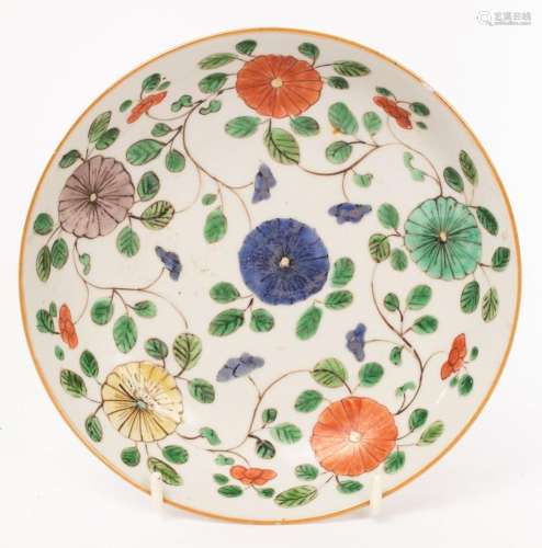 A Chinese famille vert plate, Kangxi, with floral decoration...