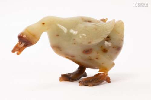 A Chinese jade carved goose, Qing Dynasty, the celadon body ...