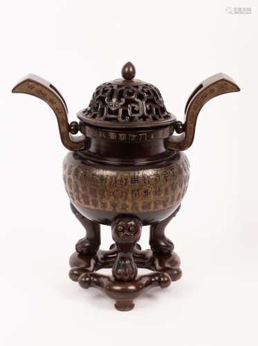 A large Chinese wooden censer, finely carved after the tradi...