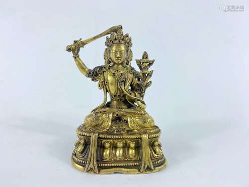 Forme de Bouddha en bronze doré