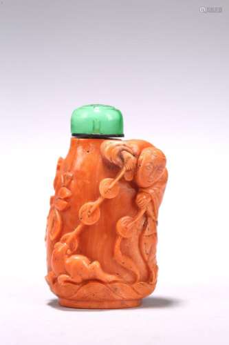 A CHINESE RED CORAL 'LIUHAN AND GOLDEN TOAD' SNUFF BOTTLE