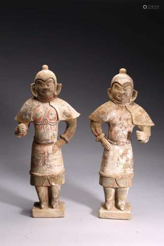 A PAIR OF PAINTED POTTERY FIGURES OF STANDING WARRIORS
