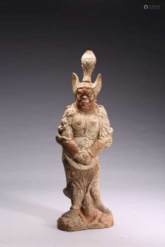 A POTTERY FIGURE OF STANDING GUARDIAN KING