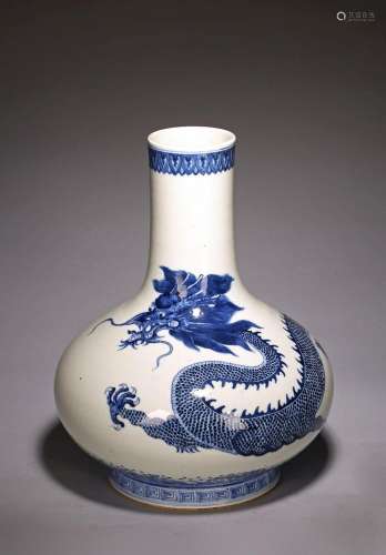 A CHINESE BLUE AND WHITE DRAGON VASE