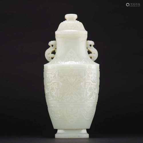 A MAGNIFICENT WHITE JADE 'TAOTIE' VASE AND COVER