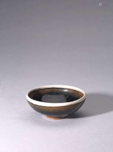 A CIZHOU BLACK GLAZED WHITE RIMMED BOWL