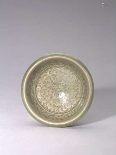 A YAOZHOU CARVED 'FLORAL' BOWL