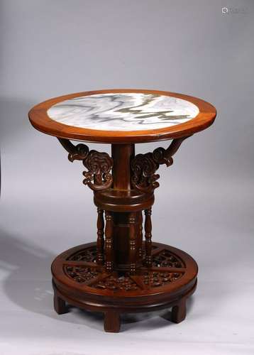 A CHINESE HARDWOOD 'MARBLE' INSET RUYI-HEAD CIRCULAR TABLE