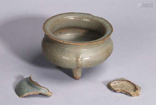 A CHINESE GUAN TRIPOD CENSER AND TWO PORCELAIN FRAGMENTS