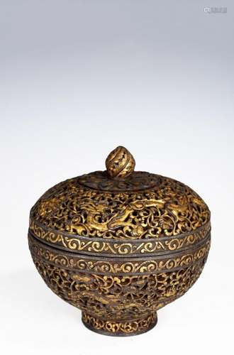 A TIBETAN TEMPLE RETICULATED GILT IRON ALMS BOWL