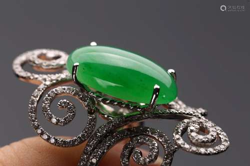 A NATURAL JADEITE AND DIAMOND RING