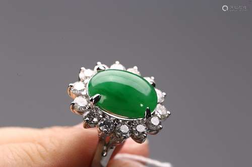 A NATURAL JADEITE AND DIAMOND RING