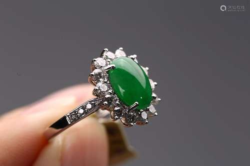 A NATURAL JADEITE AND DIAMOND RING