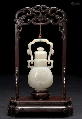 A WHITE JADE ARCHAISTIC VESSEL AND COVER YOU