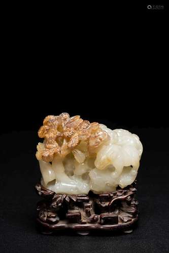 A CHINESE WHITE AND RUSSET JADE BOULDER