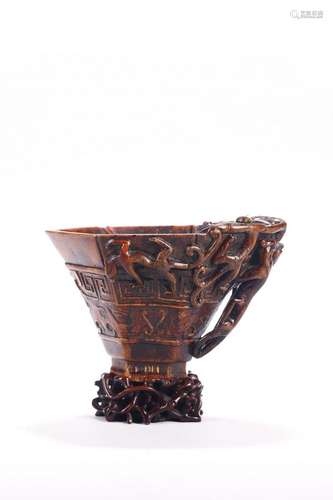 A CHINESE AGARWOOD CARVED 'CHILONG' LIBATION CUP