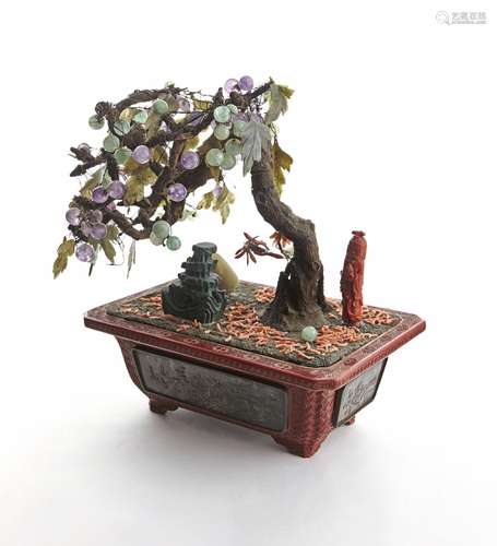 A CINNABAR LACQUER JARDINIERE WITH PRECIOUS GEM TREE AND CAR...