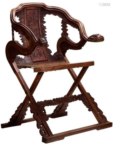 A CHINESE HARDWOOD CARVED 'DRAGON' FOLDING CHAIR