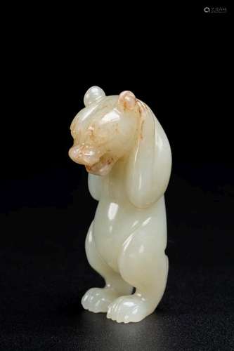 A CHINESE WHITE JADE CARVING OF STANDING BEAR