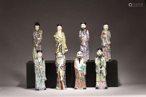 A SET OF EIGHT CHINESE FAMILLE ROSE IMMORTAL FIGURES