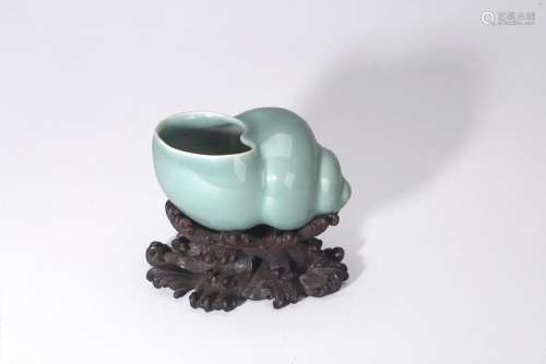 A CHINESE CELADON GLAZED 'CONCH SHELL' WASHER