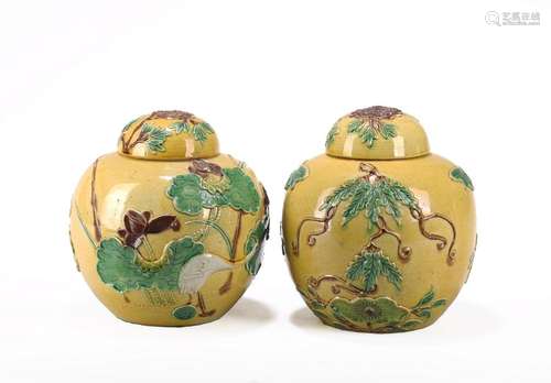 A PAIR OF YELLOW GLAZE LOTUS POND JARS AND COVERS