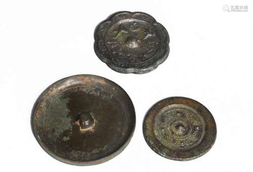 A SET OF THREE CHINESE ARCHAIC BRONZE MIRRORS