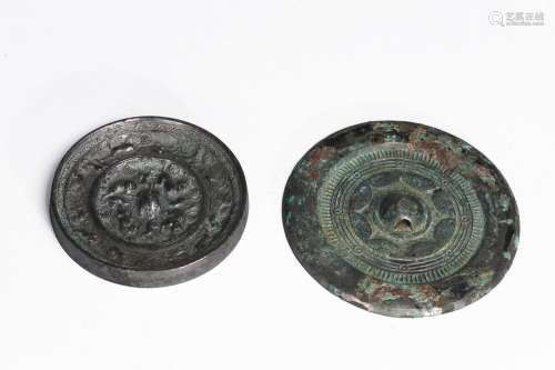 TWO ARCHAIC CHINESE BRONZE MIRRORS